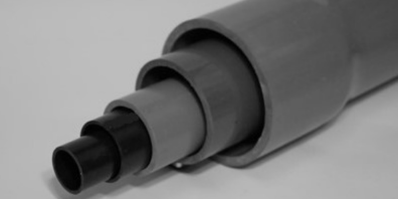 rMIX: Produzione di Tubi Lisci in PVC per Irrigazione e Fognatura